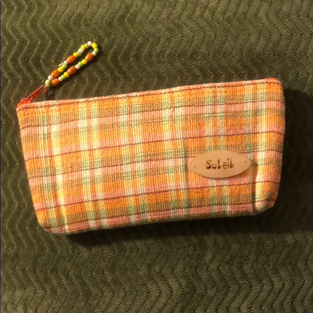 Super cute slightly padded zipper pouch.